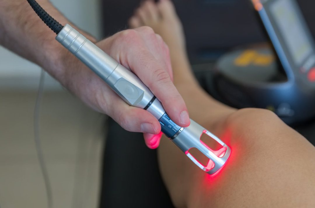 Shockwave Therapy Services Dunedin laser treatment on knee